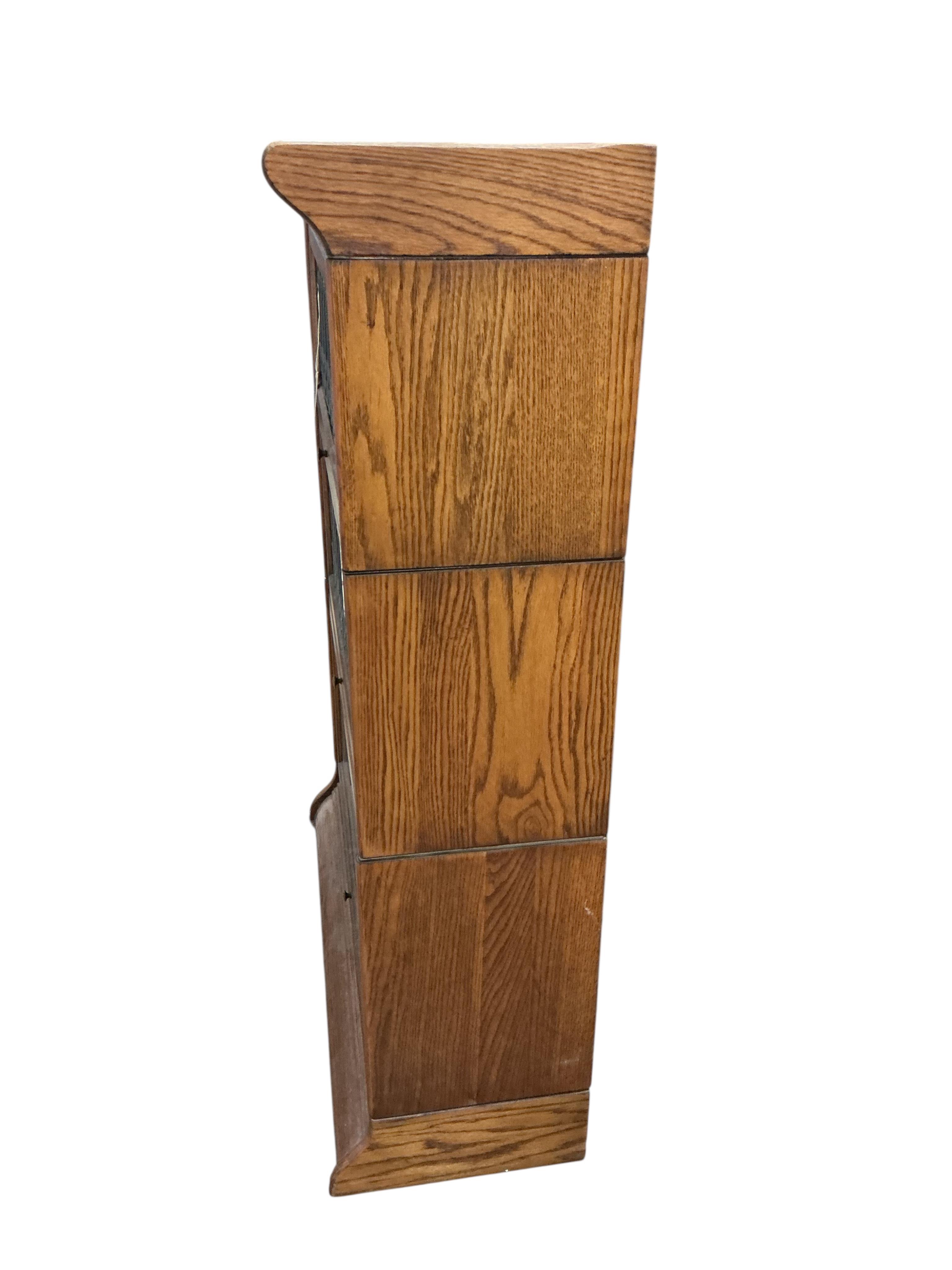 A Globe Wernicke style three section bookcase, width 86cm, depth 34cm, height 123cm
